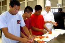 Farrington High students learning to make tomato concasse